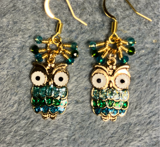 Turquoise, dark green, and aqua enamel glittery owl charm earrings adorned with tiny dangling turquoise, dark green, and aqua Chinese crystal beads.