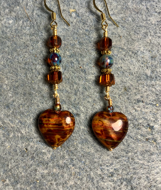 Caramel brown Czech glass heart bead earrings adorned with brown Czech glass beads.