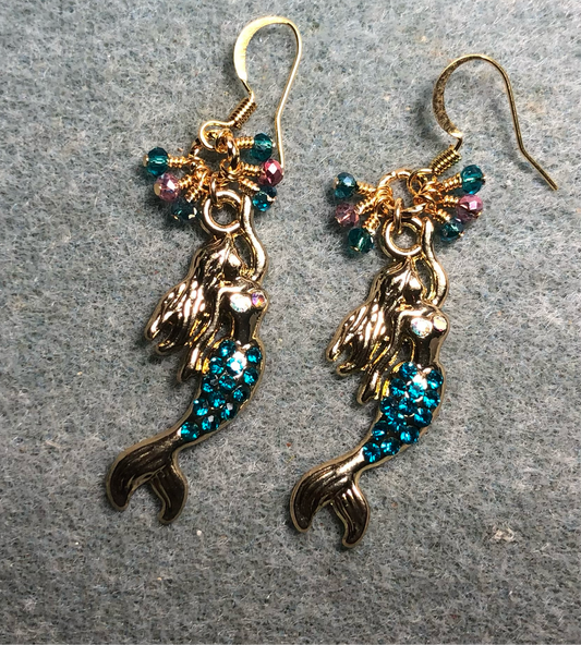 Gold and turquoise enamel and rhinestone mermaid charm earrings adorned with tiny dangling turquoise and pink Chinese crystal beads.