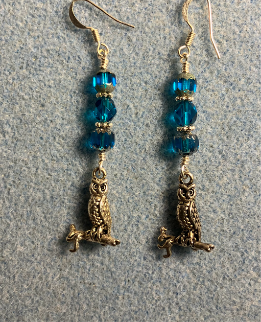 Silver owl charm earrings adorned with turquoise Czech glass beads