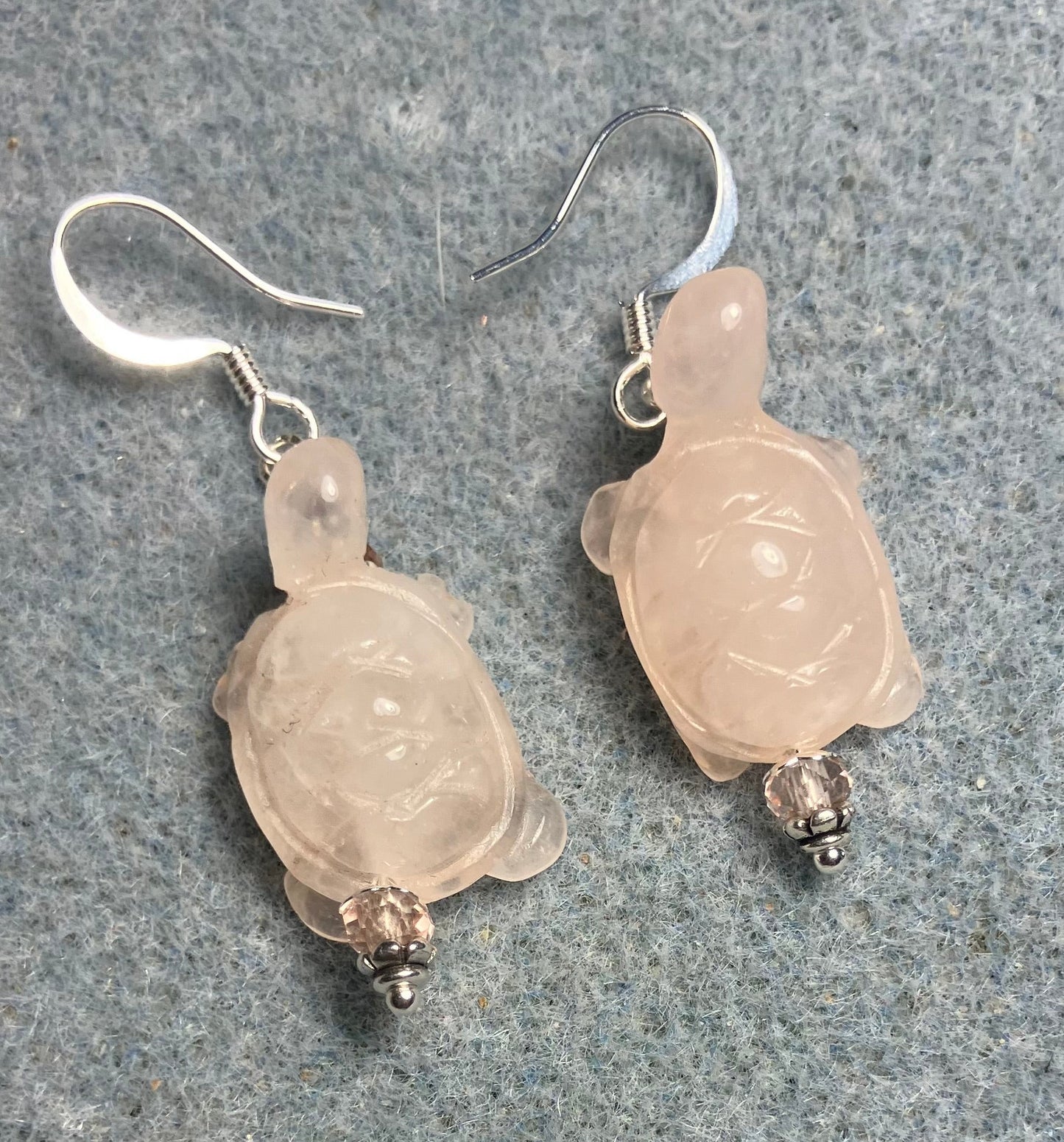 Pink rose quartz gemstone turtle bead earrings adorned with pink Chinese crystal beads.