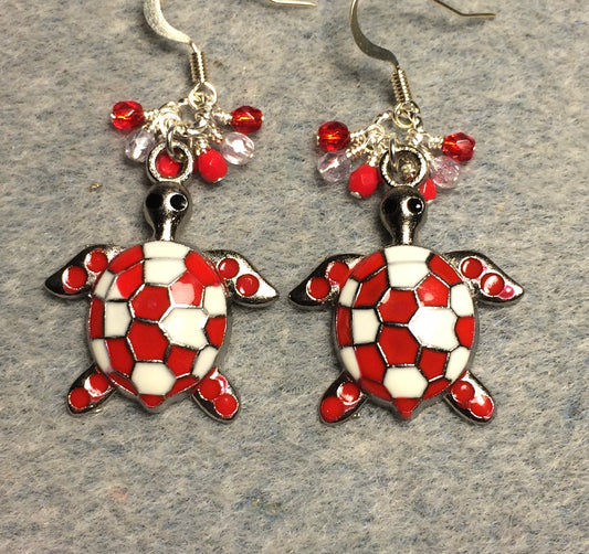 Large red and white enamel turtle charm earrings adorned with small dangling red and silver Czech glass beads.