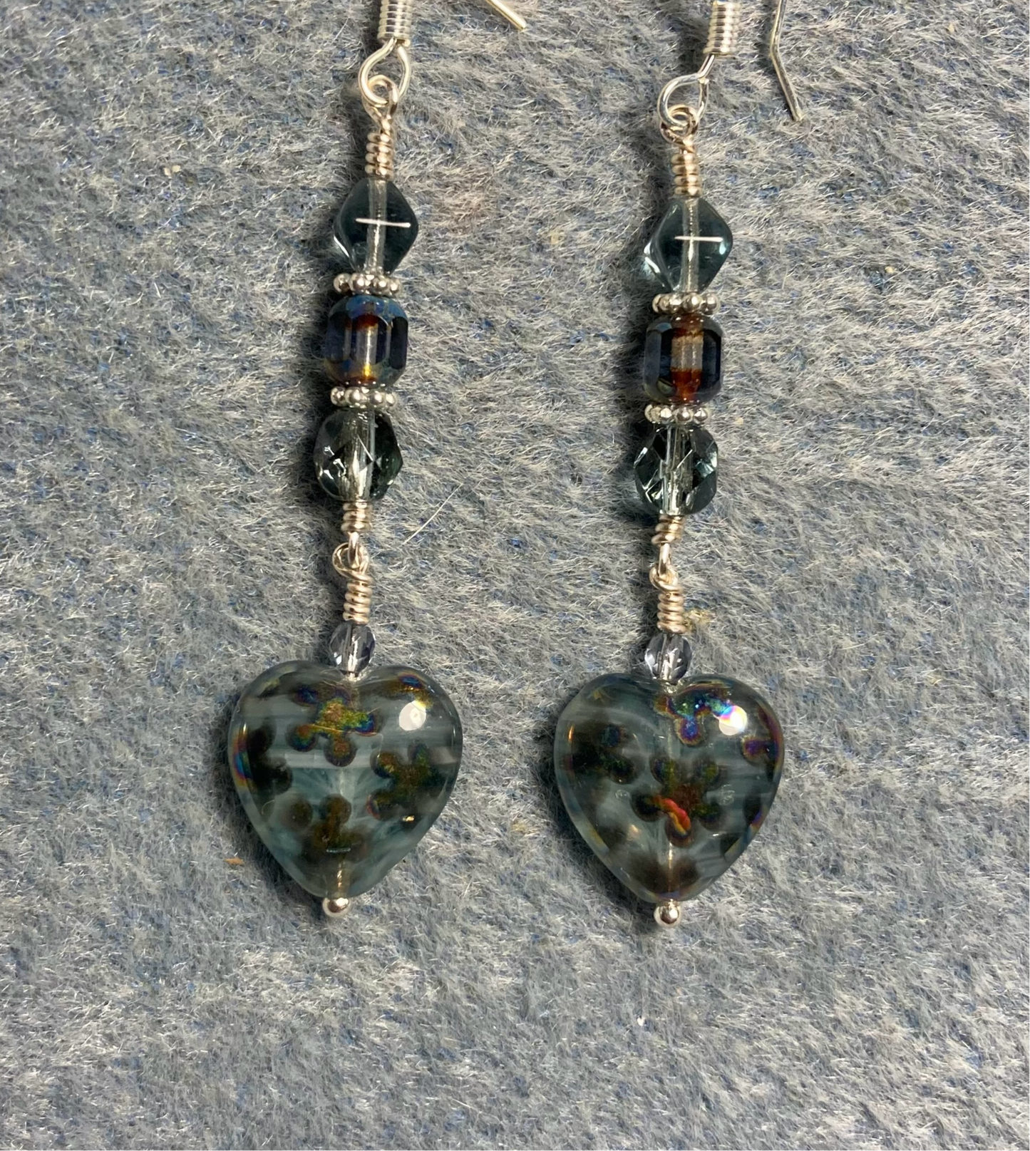 Mottled Montana blue Czech glass heart bead earrings adorned with Montana blue Czech glass beads.