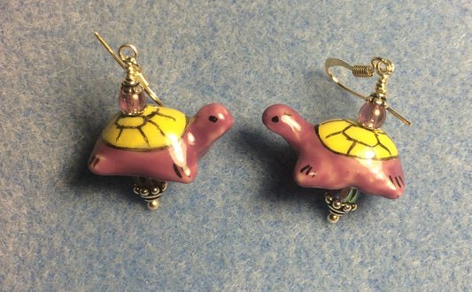 Violet and yellow ceramic turtle bead earrings adorned with violet Czech glass beads.