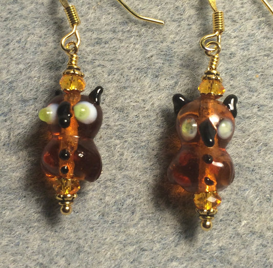 Small vintage amber lamp work owl bead earrings adorned with amber Chinese crystal beads.