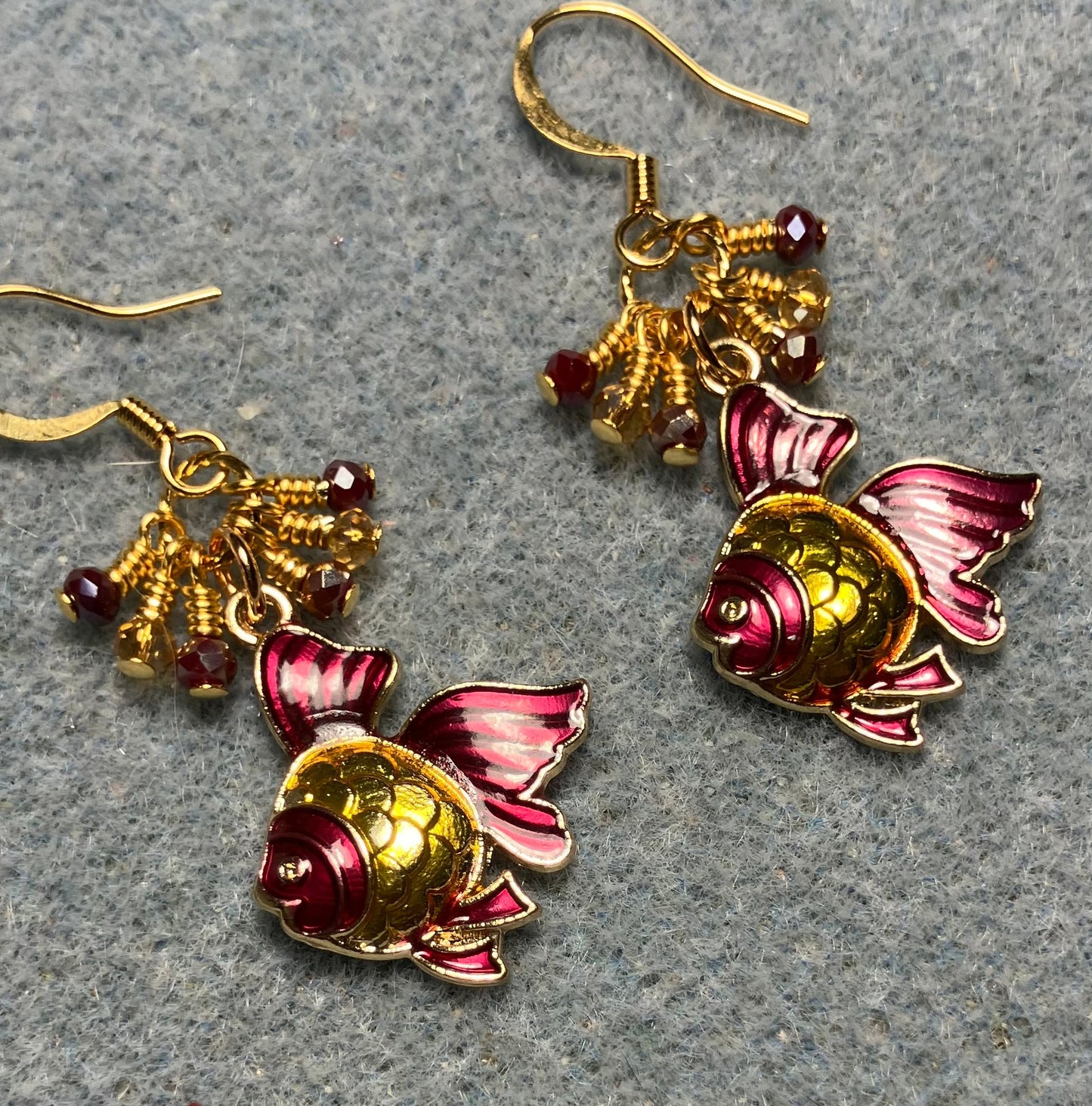 Rose pink and amber enamel angelfish charm earrings adorned with tiny dangling rose pink and amber Chinese crystal beads.