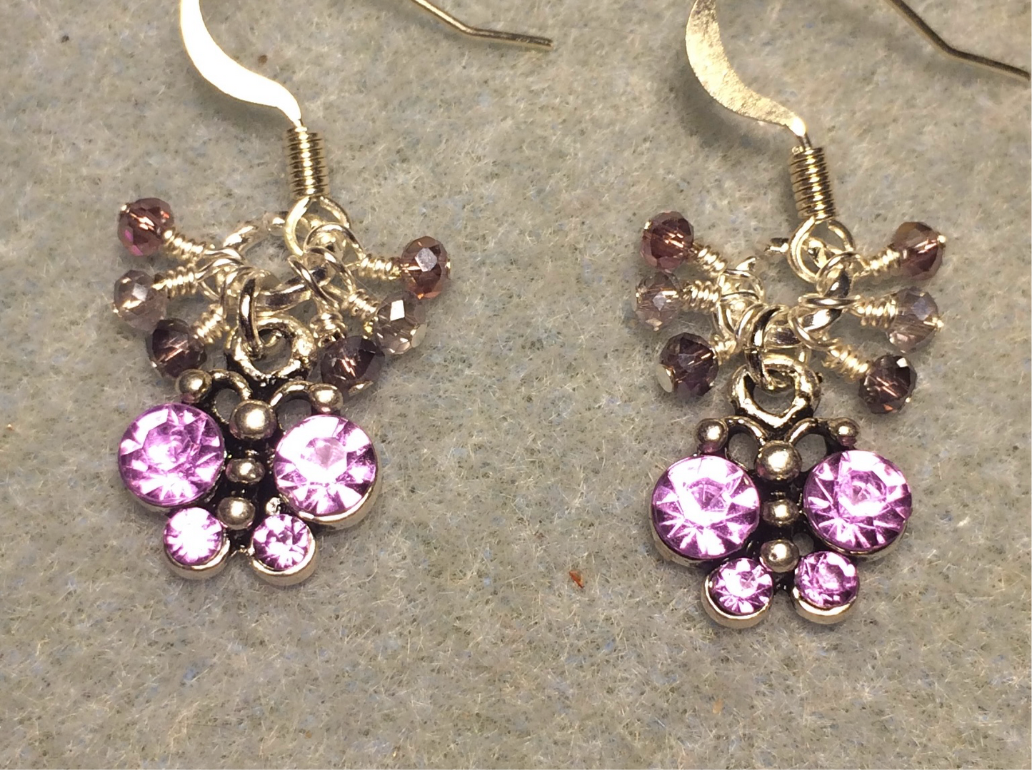 Small violet rhinestone butterfly charm earrings adorned with tiny dangling violet, silver, and purple Chinese crystal beads.