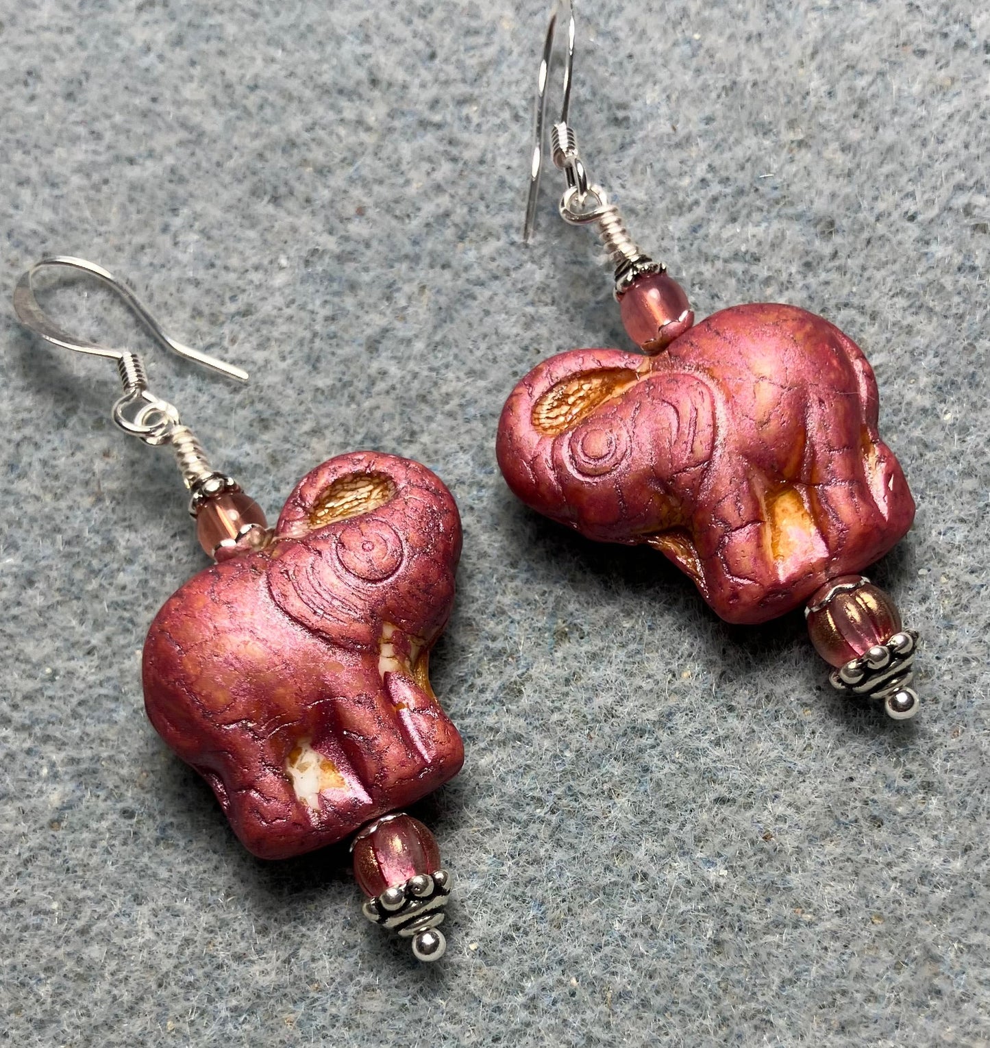 Rose pink Czech glass elephant bead earrings adorned with rose pink Czech glass beads.
