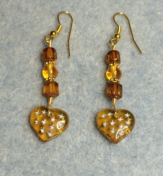 Light topaz Czech glass heart bead earrings adorned with light topaz Czech glass beads.