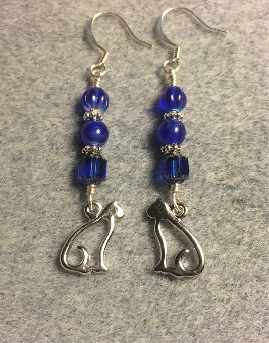 Silver silhouette cat charm earrings adorned with dark blue Czech glass beads