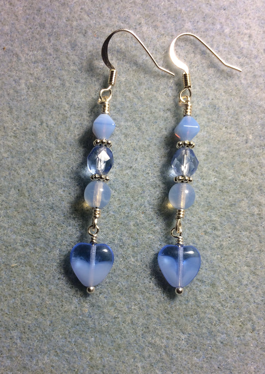 Small light milky blue Czech glass heart bead earrings adorned with light blue Czech glass beads.