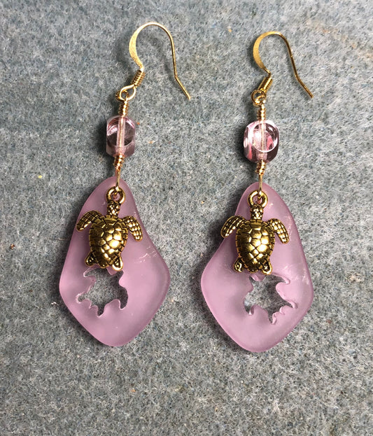 Pink sea glass sea turtle pendant bead earrings adorned with gold sea turtle charms and pink Czech glass beads.