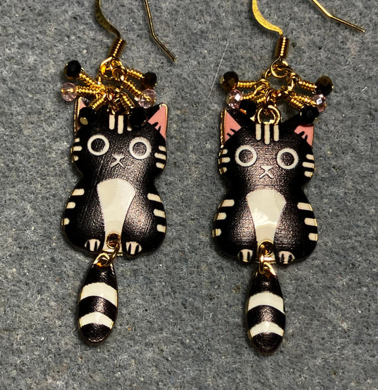 Black, white, and pink enamel cat charm earrings adorned with tiny dangling black, white, and pink Chinese crystal beads.