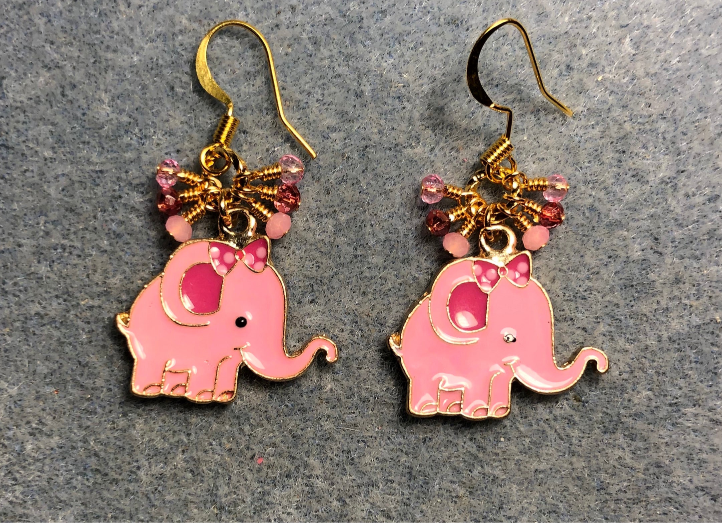 Light pink and hot pink enamel elephant charm earrings adorned with tiny dangling light pink and hot pink Chinese crystal beads.