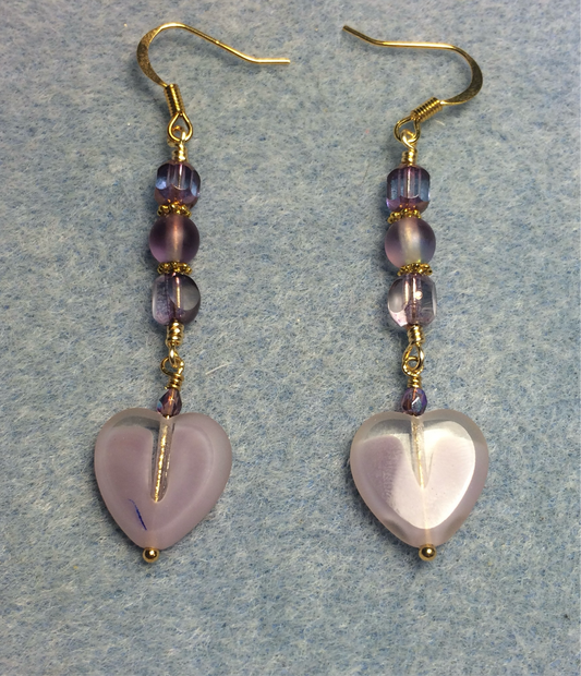 Violet Czech glass heart bead earrings adorned with violet Czech glass beads.