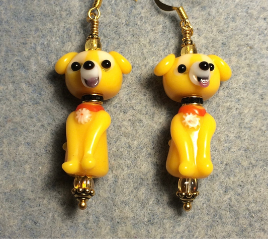 Yellow topaz lamp work puppy dog bead earrings adorned with black rhinestone rondelle “collars” and topaz Czech glass beads.