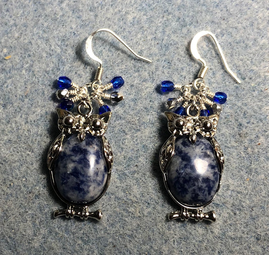 Large silver and blue sodalite gemstone owl charm earrings adorned with small dangling dark blue and silver Czech glass beads.