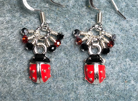 Tiny red, black, and silver enamel ladybug charm earrings adorned with tiny dangling red, black, and silver Chinese crystal beads.