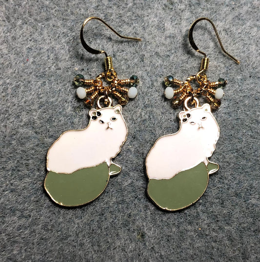 White and olive green enamel cat charm earrings adorned with tiny dangling white and olive green Chinese crystal beads.