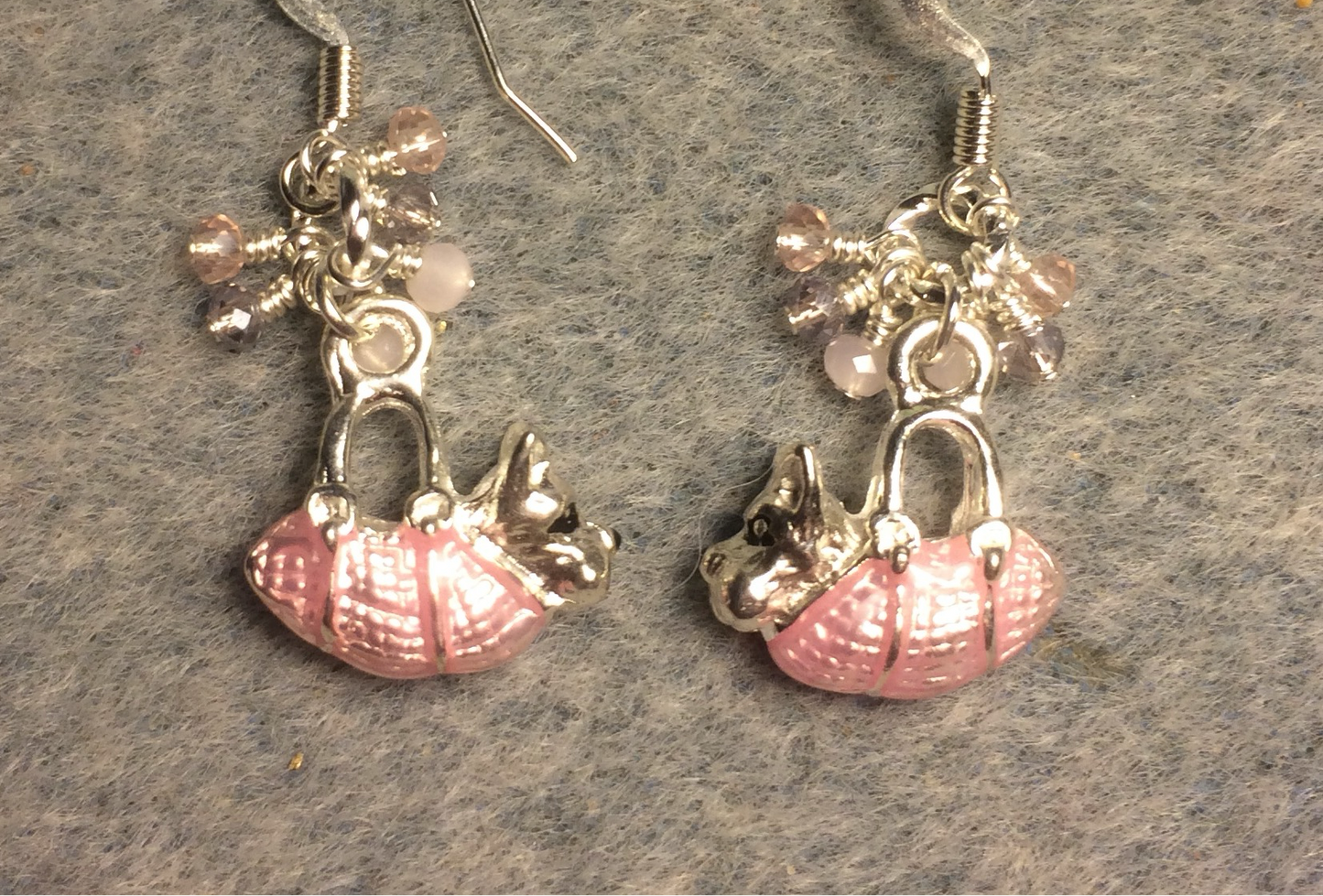 Silver and pink enamel dog in a purse charm earrings adorned with tiny dangling pink Chinese crystal beads.