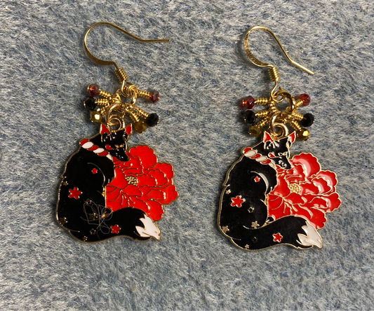 Black and red enamel fox charm earrings adorned with tiny dangling black, red, and gold Chinese crystal beads.