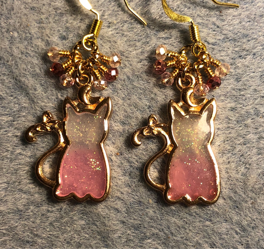 Pink and gold sparkly resin cat charm earrings adorned with small dangling pink and gold Chinese crystal beads.