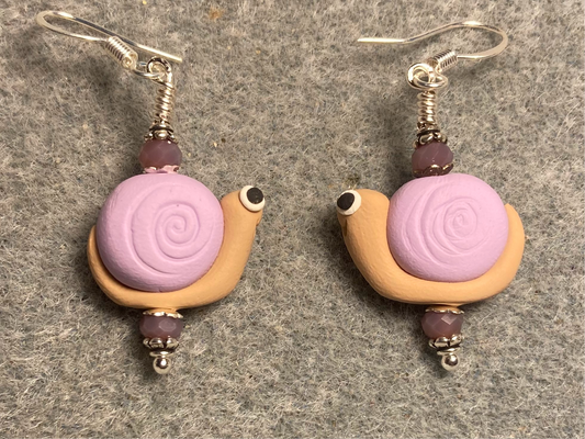 Lavender and tan polymer clay snail bead earrings adorned with lavender Chinese crystal beads.