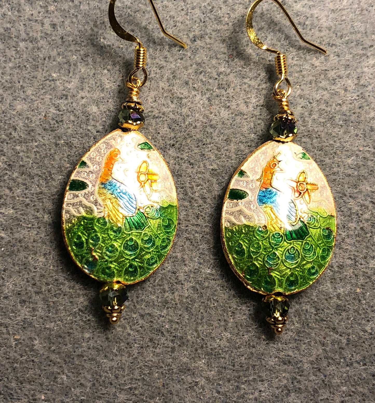 Green, white, and aqua cloisonné peacock bead earrings adorned with sparkly green Chinese crystal beads.