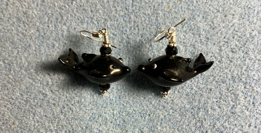 Black lamp work whale bead earrings adorned with black Chinese crystal beads.