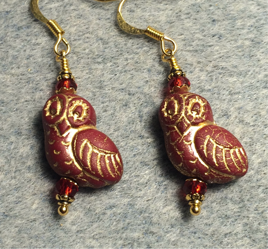 Dark red (with gold wash) fancy Czech glass owl bead earrings adorned with dark red Chinese crystal beads.