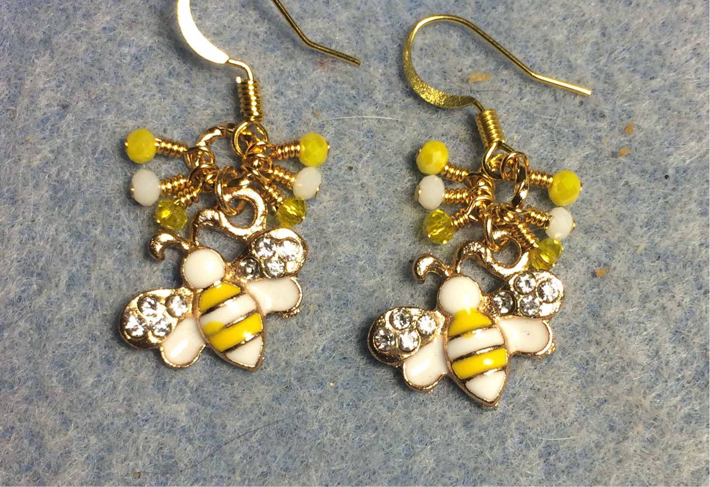 Yellow and white enamel and rhinestone honeybee charm earrings adorned with tiny dangling yellow and white Chinese crystal beads.