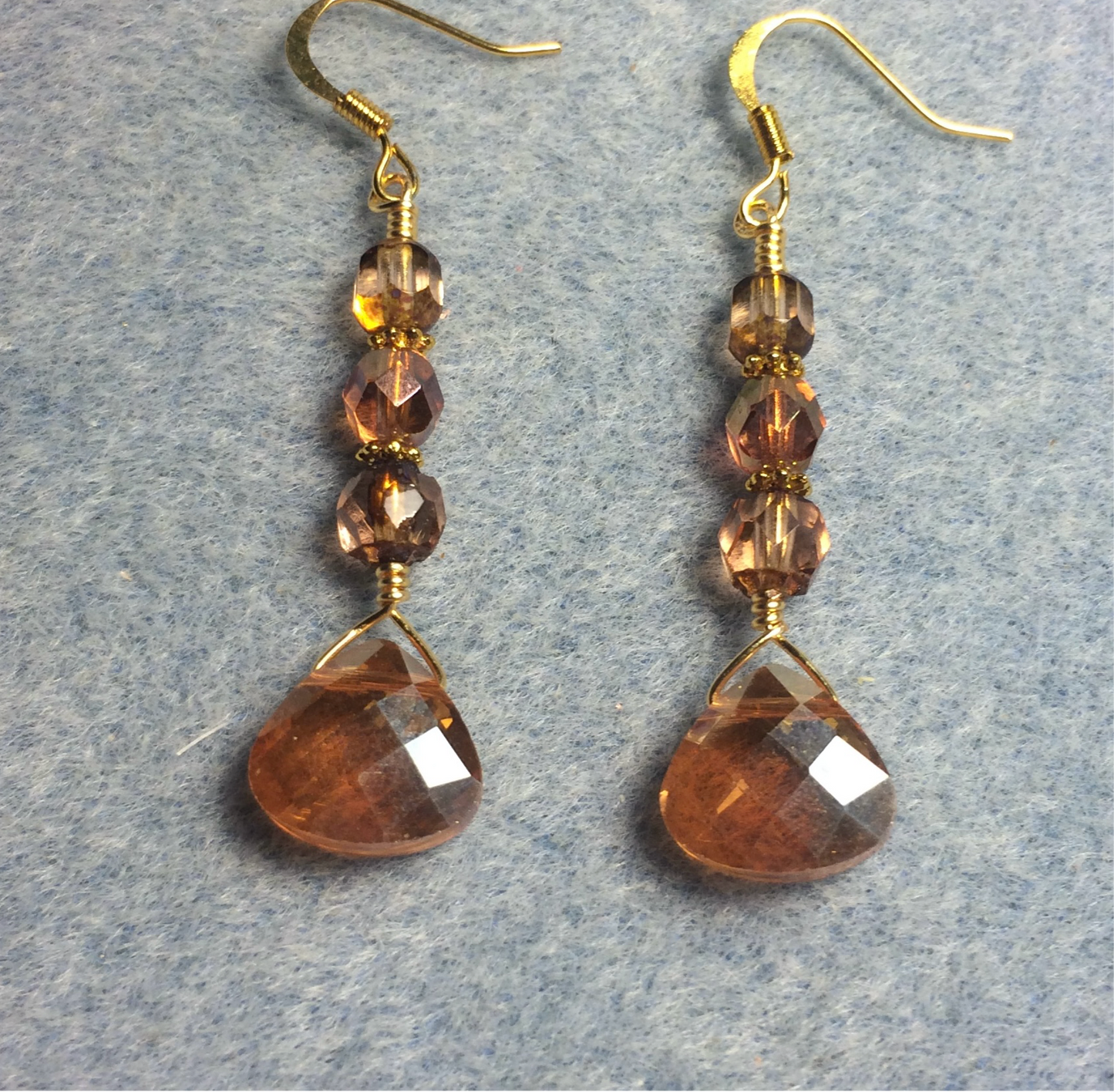 Rose gold Czech glass briolette bead earrings adorned with rose gold Czech glass beads.