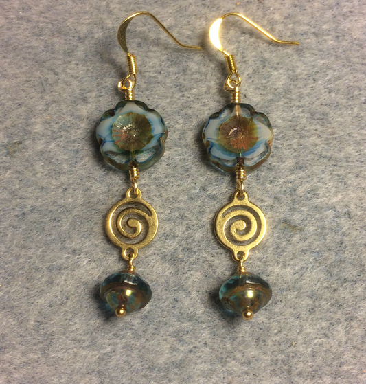 Turquoise and brown Czech glass pansy bead earrings adorned with gold swirly connectors and turquoise and gold Czech glass Saturn beads.