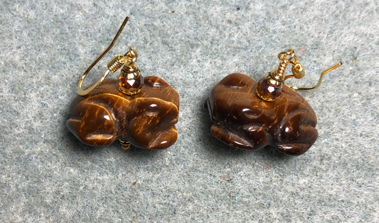 Brown tigereye gemstone frog bead earrings adorned with amber Chinese crystal beads.