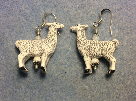 Large white ceramic llama bead earrings adorned with white Czech glass beads.