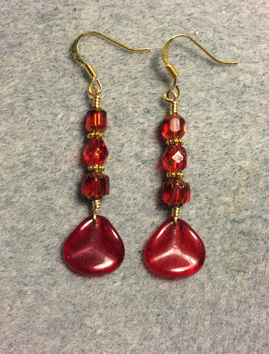 Translucent red Czech glass rose petal earrings adorned with bright red Czech glass beads.