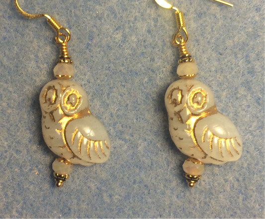 Off white (with gold wash) fancy Czech glass owl bead earrings adorned with off white Chinese crystal beads.