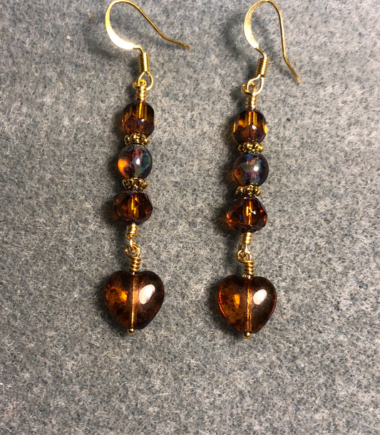 Small translucent dark amber Czech glass heart bead earrings adorned with dark amber Czech glass beads.