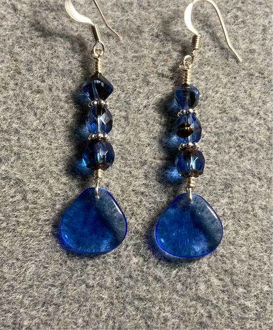 Translucent dark blue Czech glass rose petal earrings adorned with dark blue Czech glass beads.