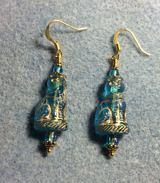 Translucent turquoise (with gold inlay) fancy Czech glass cat bead earrings adorned with turquoise Czech glass beads.