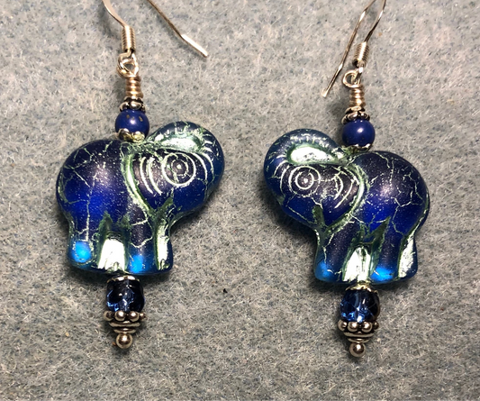 Translucent blue (with light blue inlay) Czech glass elephant bead earrings adorned with bright blue Czech glass beads.