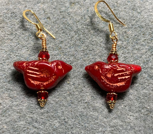 Dark red (with copper wash) Czech glass bird bead earrings adorned with dark red Chinese crystal beads.