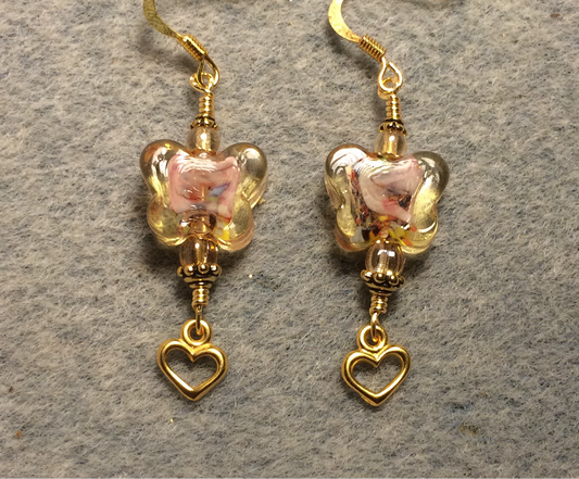 Amber lamp work butterfly bead earrings adorned with amber Czech glass beads and small gold Tierracast heart charms.