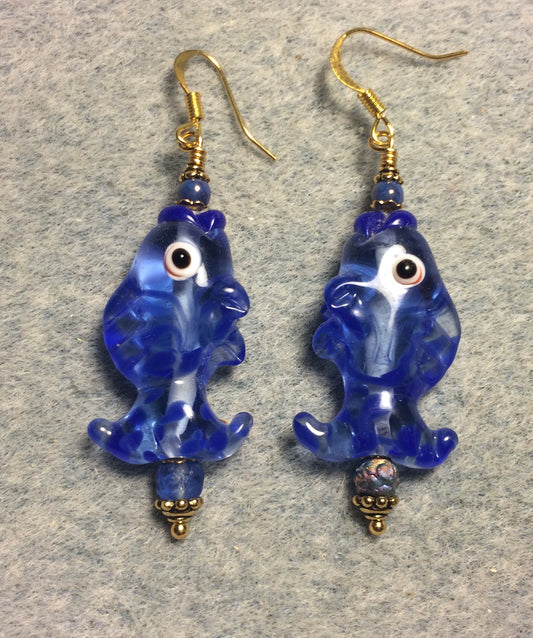 Bright blue and clear lamp work fish bead earrings adorned with blue Czech glass beads.