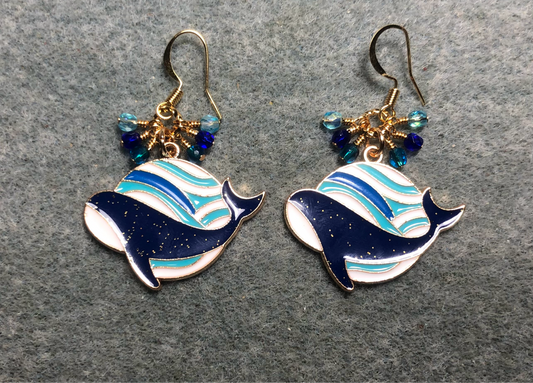 Dark blue, turquoise, and white enamel whale charm earrings adorned with tiny dangling dark blue and turquoise Czech glass beads.