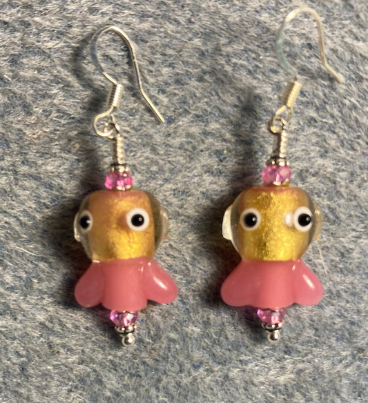 Pink and gold lamp work fish bead earrings adorned with pink Chinese crystal beads.