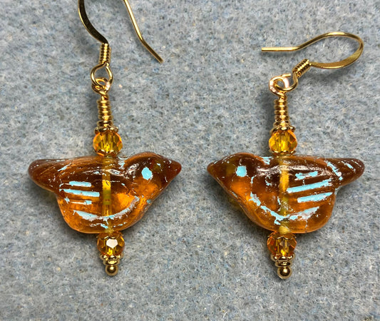 Amber (with turquoise inlay) Czech glass bird bead earrings adorned with amber Chinese crystal beads.