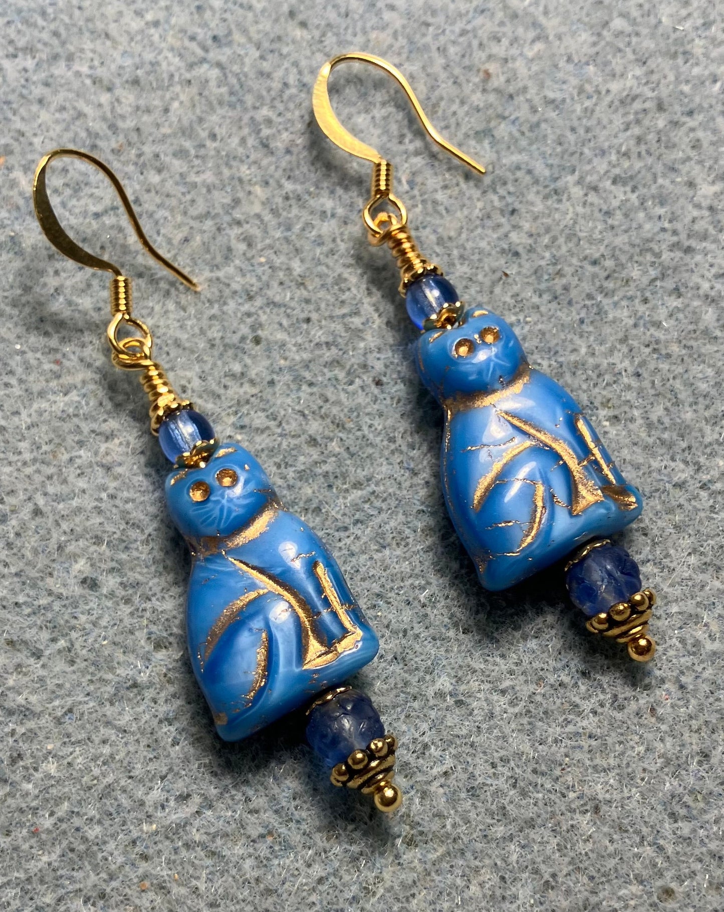 Capri blue (with gold inlay) Czech glass cat bead earrings adorned with capri blue Czech glass beads.