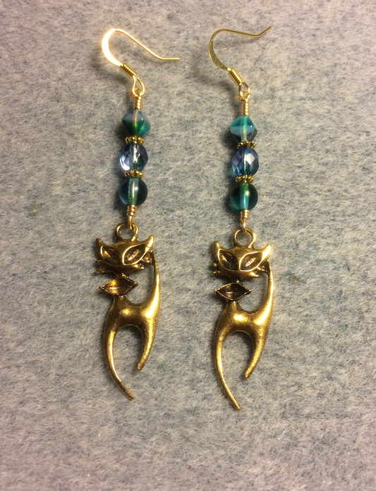 Long gold cat charm earrings adorned with blue green purple Czech glass beads
