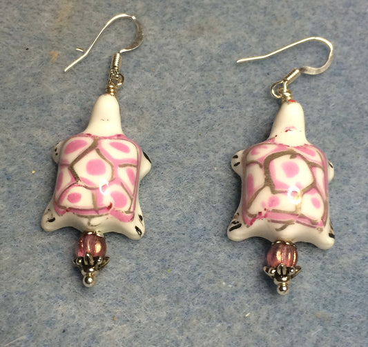 Pink and white ceramic spotted turtle bead earrings adorned with pink Czech glass beads.